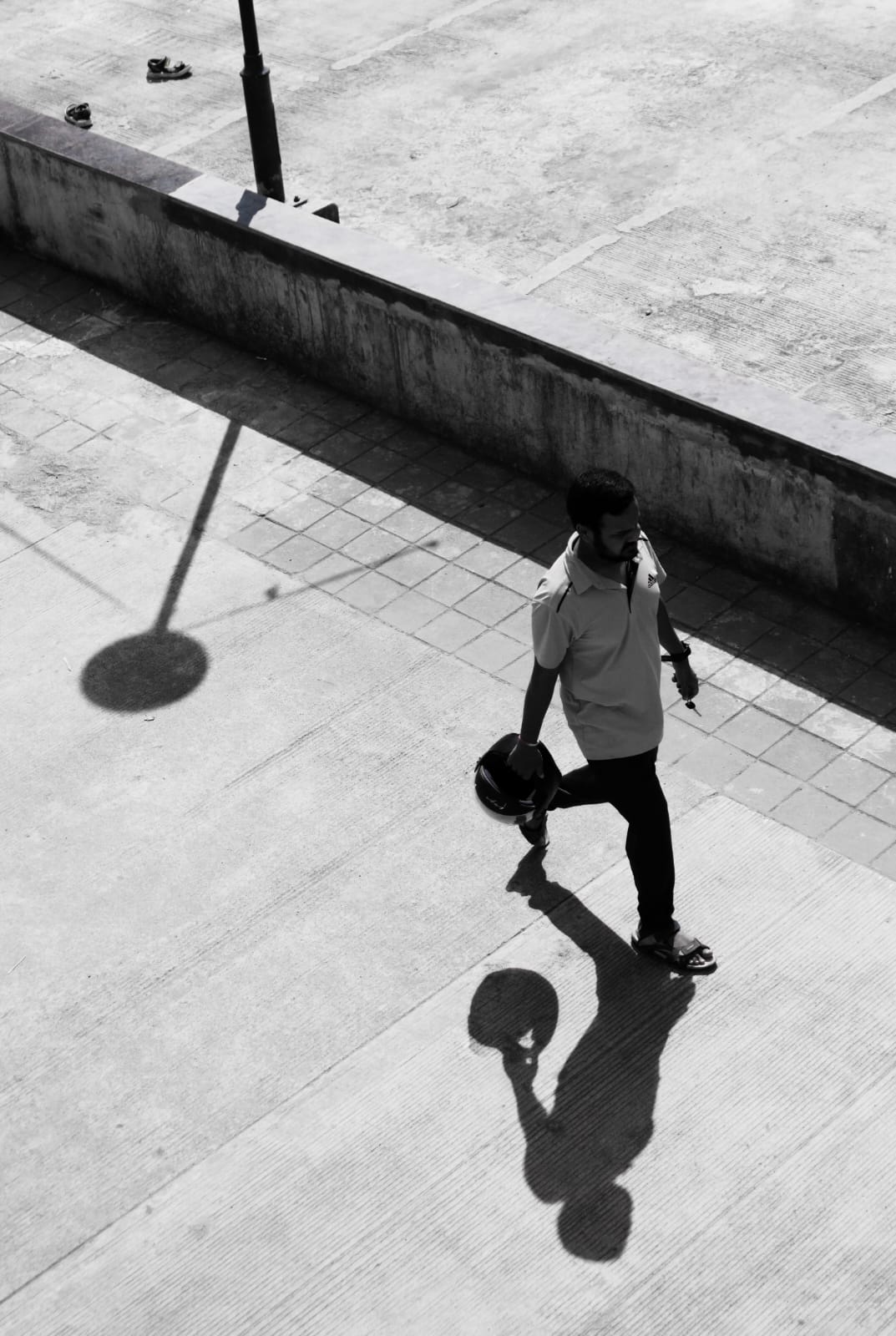 Man with helmet shadow